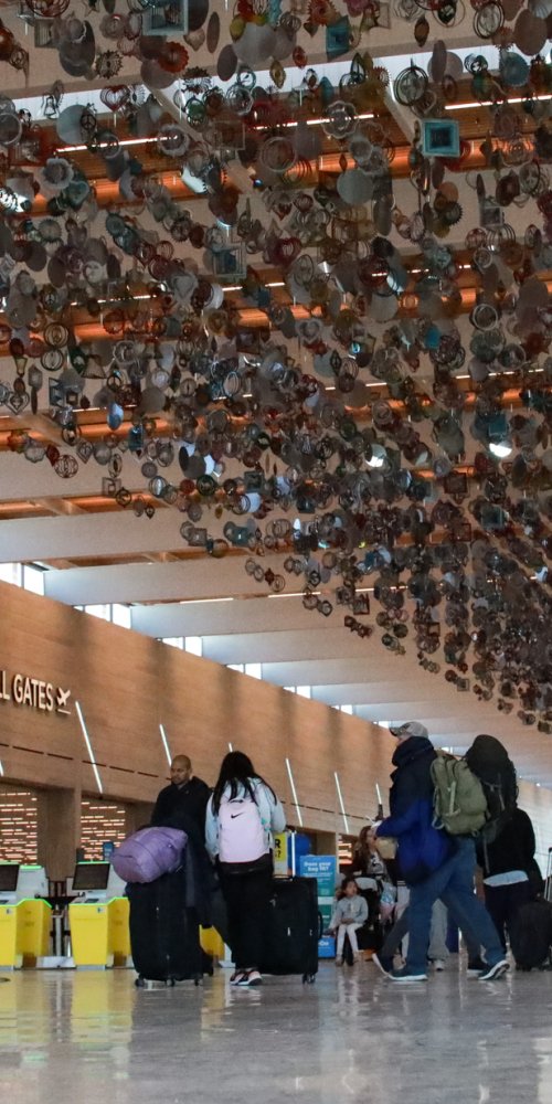 Mother and child enjoying quiet time at Kansas City Intl Airport family area
