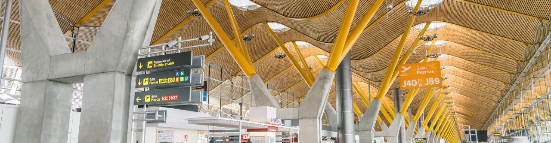 Sunset at Barajas Airport terminal highlighting family travel
