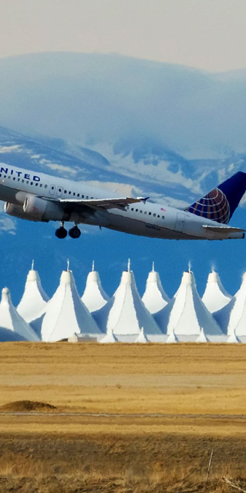 Child playing at Denver Intl Airport play area