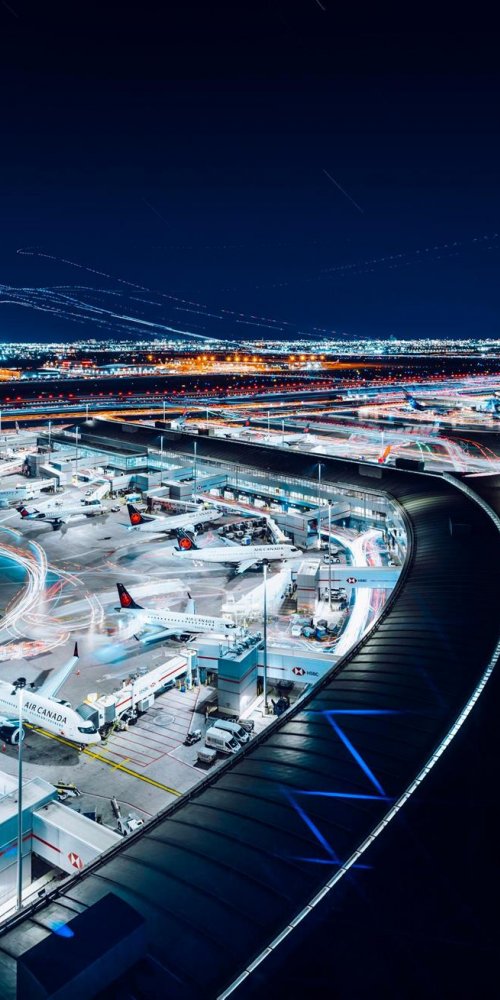 Parent and child enjoying quiet family facilities at Toronto Pearson Airport
