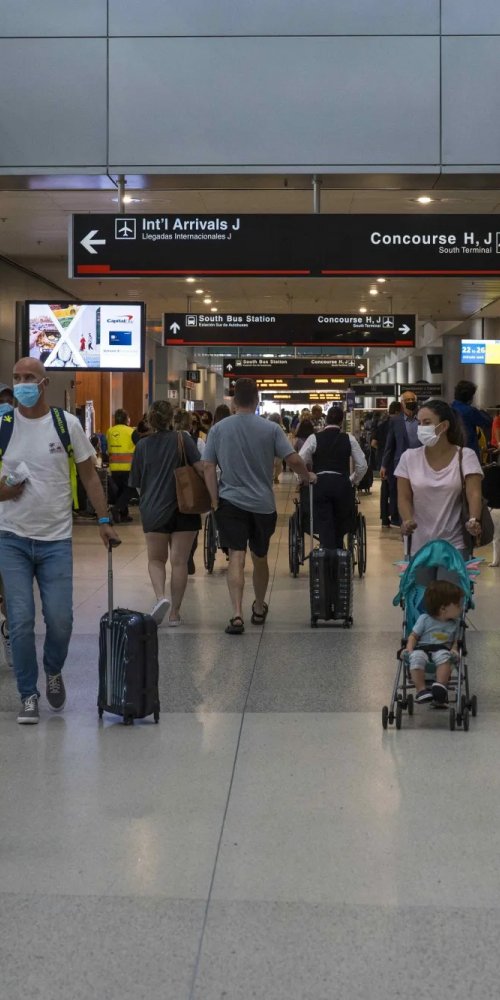 Mother and child resting in quiet room at Miami Airport