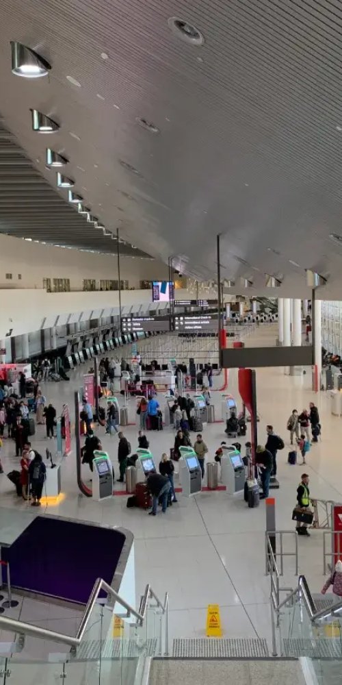 Parents and child enjoying play area at Perth Intl Airport