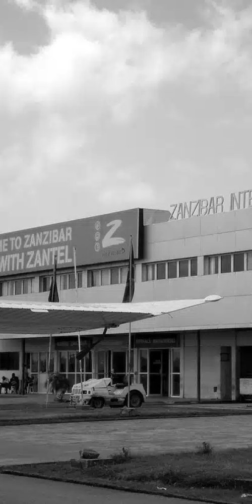 Mother and child resting in Abeid Amani Karume International Airport’s family lounge